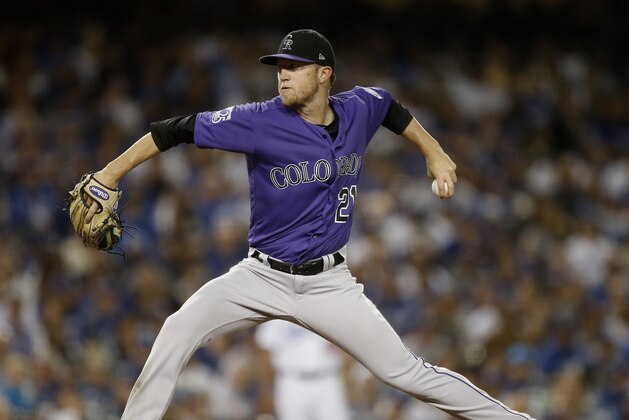 Colorado Rockies starting pitcher Kyle Freeland works to a Los Angeles Dodgers batter during the sixth inning of a baseball game in Los Angeles, Tuesday, Sept. 18, 2018. (AP Photo/Alex Gallardo)