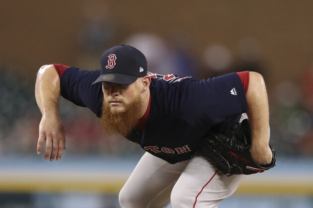 Boston Red Sox relief pitcher Craig Kimbrel prepares to throw during the ninth inning of a baseball game against the Detroit Tigers, Friday, July 20, 2018, in Detroit. (AP Photo/Carlos Osorio)