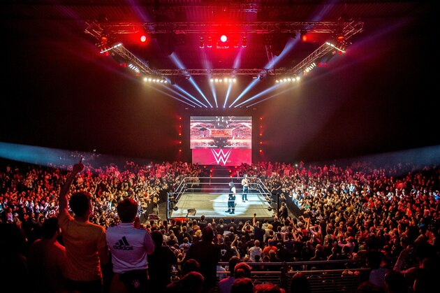 Roman and Seth celebrate in the ring during the WWE show at Zenith Arena on may 09, 2017 in Lille, France. / AFP PHOTO / PHILIPPE HUGUEN        (Photo credit should read PHILIPPE HUGUEN/AFP/Getty Images)