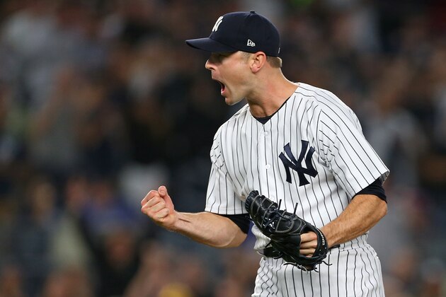 NEW YORK, NY - AUGUST 31: David Robertson #30 of the New York Yankees reacts after striking out the final batter to defeat the Detroit Tigers 7-5 in a game at Yankee Stadium on August 31, 2018 in the Bronx borough of New York City. (Photo by Rich Schultz/Getty Images)