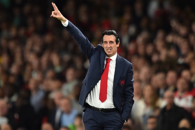 Arsenal's Spanish head coach Unai Emery shouts instructions to his players from the touchline during the English League Cup third round football match between Arsenal and Brentford at the Emirates Stadium in London on September 26, 2018. (Photo by Glyn KIRK / AFP) / RESTRICTED TO EDITORIAL USE. No use with unauthorized audio, video, data, fixture lists, club/league logos or 'live' services. Online in-match use limited to 120 images. An additional 40 images may be used in extra time. No video emulation. Social media in-match use limited to 120 images. An additional 40 images may be used in extra time. No use in betting publications, games or single club/league/player publications. /         (Photo credit should read GLYN KIRK/AFP/Getty Images)
