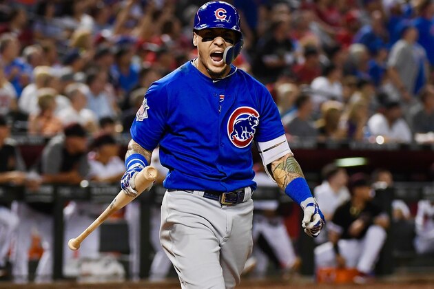PHOENIX, AZ - SEPTEMBER 18:  Javier Baez #9 of the Chicago Cubs hits a two-run home run against the Arizona Diamondbacks during the first inning of the MLB game at Chase Field on September 18, 2018 in Phoenix, Arizona.  (Photo by Christian Petersen/Getty Images)