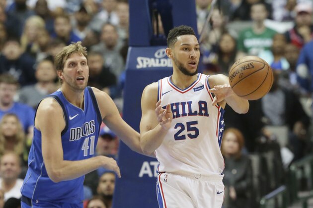 Philadelphia 76ers guard Ben Simmons (25) passes off against Dallas Mavericks forward Dirk Nowitzki (41) of Germany during fourth quarter of an NBA basketball game in Dallas, Saturday, Oct. 28, 2017. The 76ers won 112-110. (AP Photo/LM Otero)