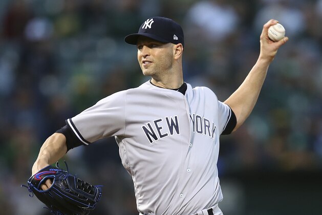 New York Yankees pitcher J.A. Happ works against the Oakland Athletics in the first inning of a baseball game Tuesday, Sept. 4, 2018, in Oakland, Calif. (AP Photo/Ben Margot)