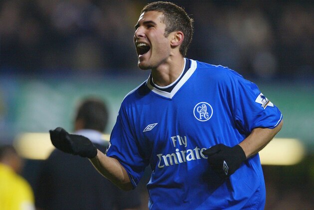 LONDON - JANUARY 14:  Adrian Mutu of Chelsea celebrates scoring their third goal during the FA Cup Third round replay between Chelsea and Watford at Stamford Bridge on January 14, 2004 in London.  (Photo by Phil Cole/Getty Images)