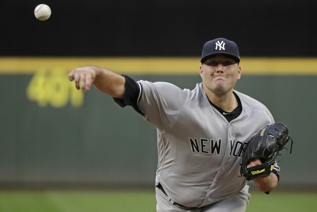 New York Yankees starting pitcher Lance Lynn throws to a Seattle Mariners batter during the third inning of a baseball game Saturday, Sept. 8, 2018, in Seattle. (AP Photo/Ted S. Warren)