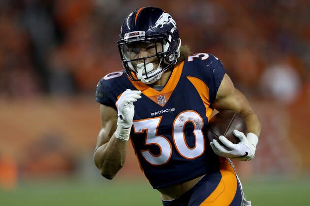 DENVER, CO - OCTOBER 01:  Phillip Lindsay #30 of the Denver Broncos carries the ball against the Kansas City Chiefs at Broncos Stadium at Mile High on October 1, 2018 in Denver, Colorado.  (Photo by Matthew Stockman/Getty Images)