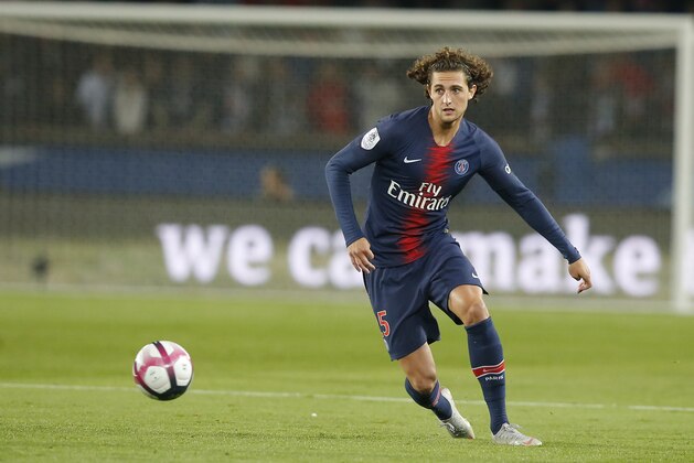 PSG's Adrien Rabiot controls the ball during the French League One soccer match between Paris-Saint-Germain and Reims at Parc des Princes stadium in Paris, France, Wednesday, Sept. 26, 2018. (AP Photo/Michel Euler)