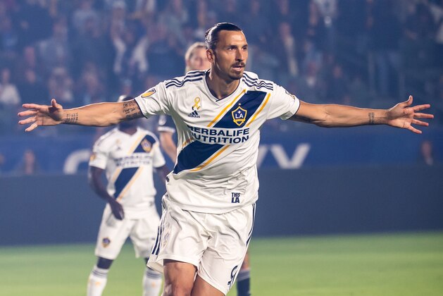 CARSON, CA - SEPTEMBER 29: Zlatan Ibrahimovic #9 of Los Angeles Galaxy celebrates his penalty kick goal during the Los Angeles Galaxy's MLS match against Vancouver Whitecaps at the StubHub Center on September 29, 2018 in Carson, California.  The Los Angeles Galaxy won the match 3-0 (Photo by Shaun Clark/Getty Images)