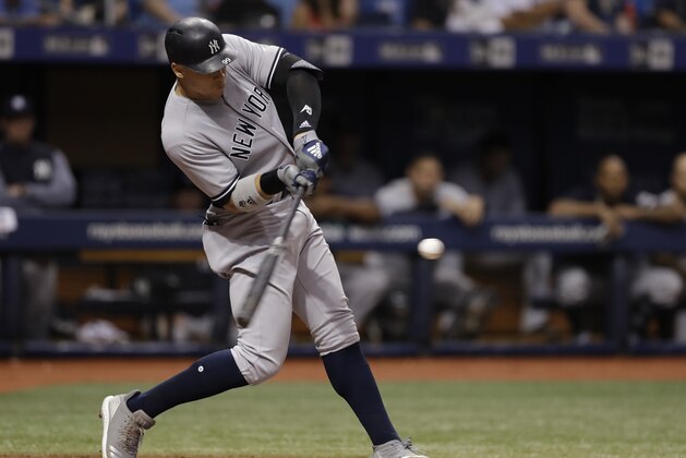 New York Yankees' Aaron Judge singles off Tampa Bay Rays relief pitcher Yonny Chirinos during the fifth inning of a baseball game Wednesday, Sept. 26, 2018, in St. Petersburg, Fla. (AP Photo/Chris O'Meara)
