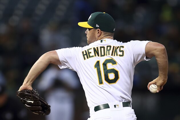 Oakland Athletics pitcher Liam Hendriks works against the Los Angeles Angels during the first inning of a baseball game Tuesday, Sept. 18, 2018, in Oakland, Calif. (AP Photo/Ben Margot)