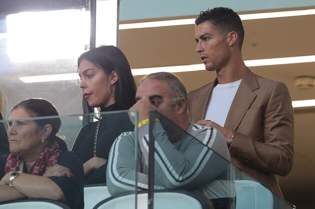 TURIN, ITALY - OCTOBER 02:  Cristiano Ronaldo and Georgina Rodriguez are seen during the Group H match of the UEFA Champions League between Juventus and BSC Young Boys at Allianz Stadium on October 2, 2018 in Turin, Italy.  (Photo by Emilio Andreoli/Getty Images)