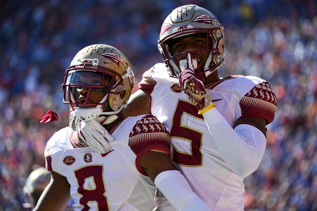 GAINESVILLE, FL - NOVEMBER 25: Nyqwan Murray #8 and Da'Vante Phillips #5 of the Florida State Seminoles react after an FSU touchdown during the first half of the game against the Florida Gators at Ben Hill Griffin Stadium on November 25, 2017 in Gainesville, Florida. (Photo by Rob Foldy/Getty Images)