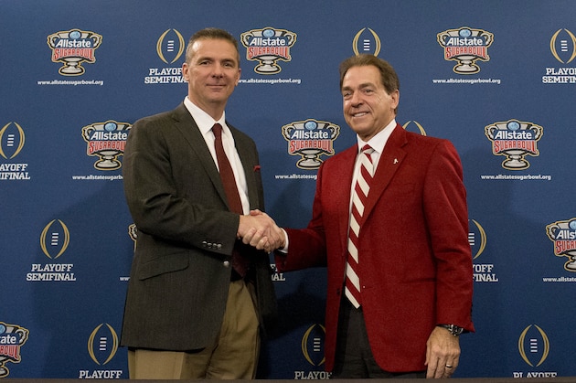 Ohio State coach Urban Meyer, left, and Alabama head coach Nick Saban shake hands during a press conference at the Marriott downtown convention center in New Orleans, Wednesday, Dec. 31, 2014. Ohio State is slated to square off against Alabama in the Sugar Bowl on New Year's Day. (AP Photo/Brynn Anderson)