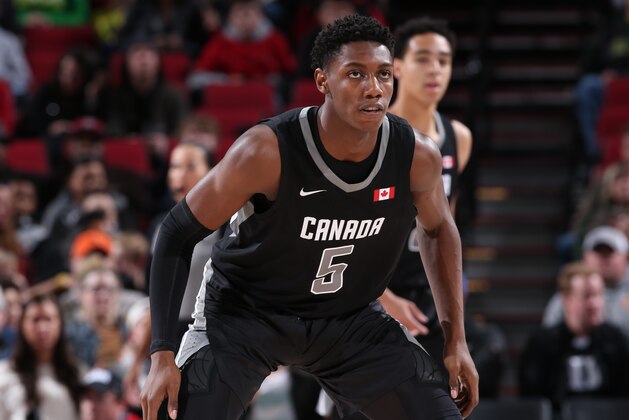 PORTLAND, OR - APRIL 13: R.J. Barrett #5 of Team World plays defense against Team USA during the Nike Hoop Summit on April 13, 2018 at the MODA Center Arena in Portland, Oregon. NOTE TO USER: User expressly acknowledges and agrees that, by downloading and or using this photograph, User is consenting to the terms and conditions of License Agreement. Mandatory Copyright Notice: Copyright 2018 NBAE (Photo by Sam Forencich/NBAE via Getty Images)