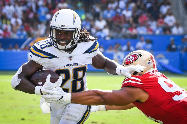 CARSON, CA - SEPTEMBER 30: Running back Melvin Gordon #28 of the Los Angeles Chargers runs the ball by defensive end Solomon Thomas #94 of the San Francisco 49ers at StubHub Center on September 30, 2018 in Carson, California. (Photo by Jayne Kamin-Oncea/Getty Images)