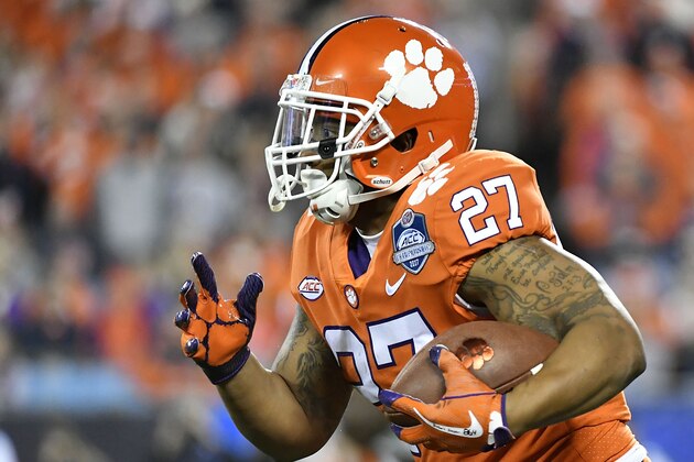 CHARLOTTE, NC - DECEMBER 02:  C.J. Fuller #27 of the Clemson Tigers runs the football against the Miami Hurricanes during the ACC Football Championship at Bank of America Stadium on December 2, 2017 in Charlotte, North Carolina.  (Photo by Mike Comer/Getty Images)