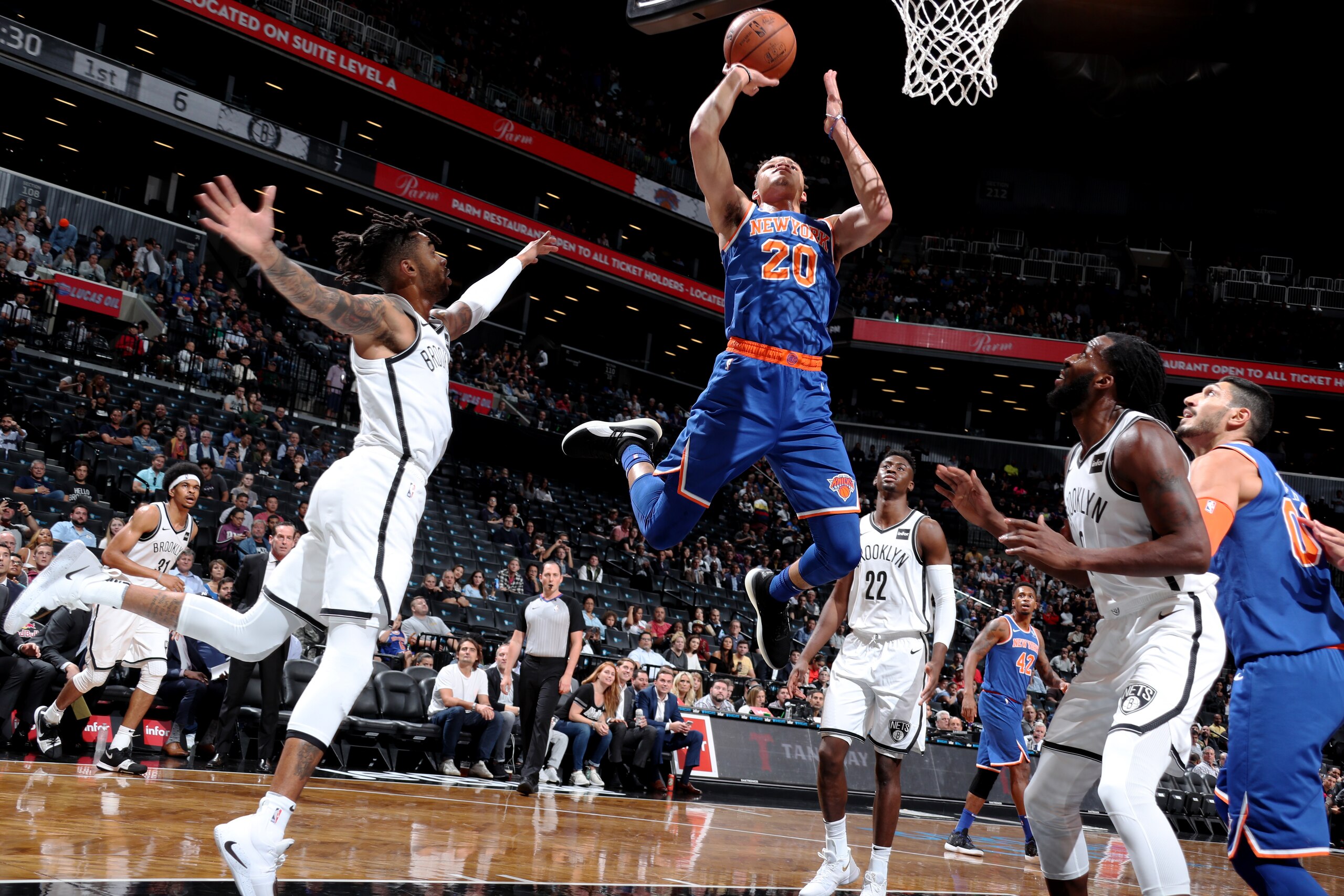 BROOKLYN, NY - OCTOBER 3: Kevin Knox #20 of the New York Knicks dunks the ball against the Brooklyn Nets  during a pre-season game on October 3, 2018 at Barclays Center in Brooklyn, New York. NOTE TO USER: User expressly acknowledges and agrees that, by downloading and or using this Photograph, user is consenting to the terms and conditions of the Getty Images License Agreement. Mandatory Copyright Notice: Copyright 2018 NBAE (Photo by Nathaniel S. Butler/NBAE via Getty Images)