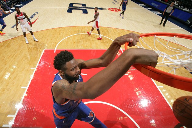 WASHINGTON, DC - OCTOBER 01:  Mitchell Robinson #26 of the New York Knicks goes in for the dunk against the Washington Wizards during a pre-season game on October 1, 2018 at Capital One Arena in Washington, DC. NOTE TO USER: User expressly acknowledges and agrees that, by downloading and/or using this photograph, user is consenting to the terms and conditions of the Getty Images License Agreement. Mandatory Copyright Notice: Copyright 2018 NBAE (Photo by Ned Dishman/NBAE via Getty Images)