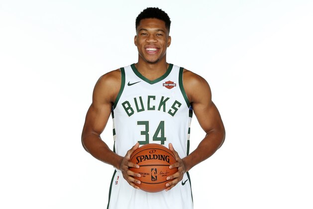 MILWAUKEE, WI - SEPTEMBER 24: Giannis Antetokounmpo #34 of the Milwaukee Bucks poses for a portrait during Milwaukee Bucks Media Day at Fiserv Forum on September 24, 2018 in Milwaukee, Wisconsin. NOTE TO USER: User expressly acknowledges and agrees that, by downloading and/or using this photograph, user is consenting to the terms and conditions of the Getty Images License Agreement.  Mandatory Copyright Notice: Copyright 2018 NBAE (Photo by Gary Dineen/NBAE via Getty Images)