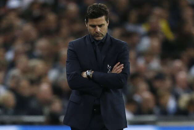 Tottenham Hotspur's Argentinian head coach Mauricio Pochettino reacts during the Champions League group B football match match between Tottenham Hotspur and Barcelona at Wembley Stadium in London, on October 3, 2018. (Photo by Ian KINGTON / IKIMAGES / AFP)        (Photo credit should read IAN KINGTON/AFP/Getty Images)
