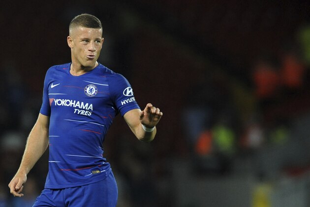 Chelsea's Ross Barkley gives instructions to his players during the English League Cup soccer match between Liverpool and Chelsea at Anfield stadium in Liverpool, England, Wednesday, Sept. 26, 2018. (AP Photo/Rui Vieira)