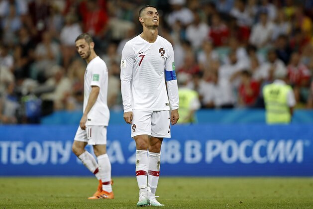 Portugal's Cristiano Ronaldo reacts disappointed during the round of 16 match between Uruguay and Portugal at the 2018 soccer World Cup at the Fisht Stadium in Sochi, Russia, Saturday, June 30, 2018. (AP Photo/Francisco Seco)