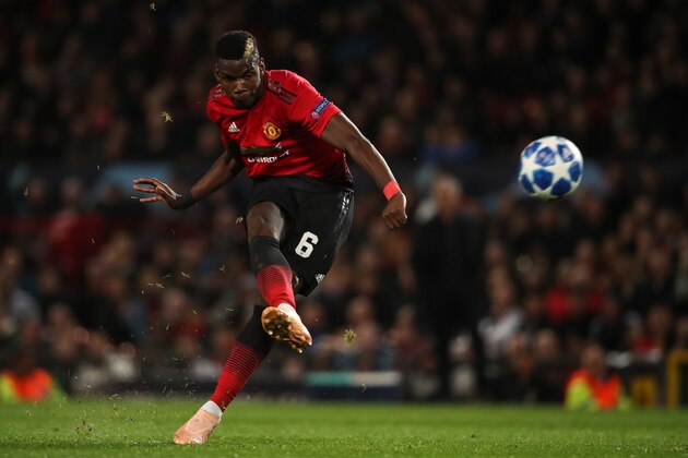 MANCHESTER, ENGLAND - OCTOBER 02: Paul Pogba of Manchester United takes a free kick  during the Group H match of the UEFA Champions League between Manchester United and Valencia at Old Trafford on October 2, 2018 in Manchester, United Kingdom. (Photo by Matthew Ashton - AMA/Getty Images)