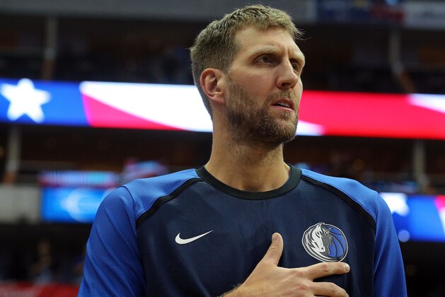 DALLAS, TX - SEPTEMBER 29:  Dirk Nowitzki #41 of the Dallas Mavericks stands for the National Anthem before the preseason game against the Beijing Ducks at American Airlines Center on September 29, 2018 in Dallas, Texas.  (Photo by Richard Rodriguez/Getty Images)