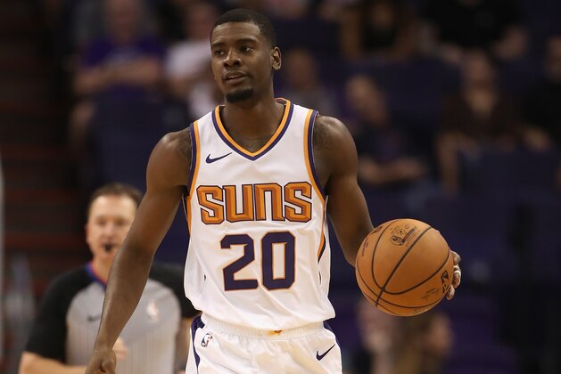 PHOENIX, AZ - OCTOBER 03:  Josh Jackson #20 of the Phoenix Suns habdles the ball during the first half of the NBA game against the New Zealand Breakers at Talking Stick Resort Arena on October 3, 2018 in Phoenix, Arizona.  NOTE TO USER: User expressly acknowledges and agrees that, by downloading and or using this photograph, User is consenting to the terms and conditions of the Getty Images License Agreement.  (Photo by Christian Petersen/Getty Images)