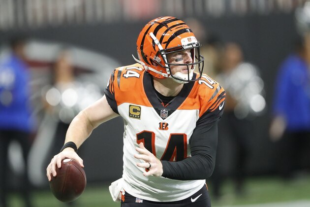 Cincinnati Bengals quarterback Andy Dalton (14) works out of the pocket against the Atlanta Falcons during the second half of an NFL football game, Sunday, Sept. 30, 2018, in Atlanta. (AP Photo/John Bazemore)