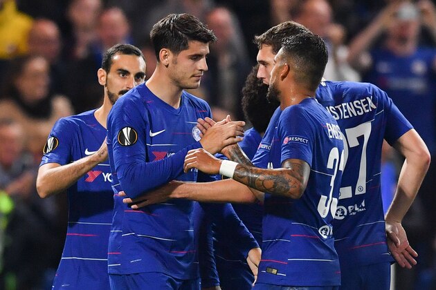 Chelsea's Spanish striker Alvaro Morata (C) celebrates scoring the opening goal during the UEFA Europa League Group L football match between Chelsea and Vidi at Stamford Bridge in London on October 4, 2018. (Photo by Ben STANSALL / AFP)        (Photo credit should read BEN STANSALL/AFP/Getty Images)