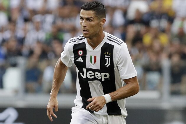 Juventus' Cristiano Ronaldo controls the ball during a Serie A soccer match between Juventus and Lazio, at the Allianz stadium in Turin, Italy,Saturday, Aug. 25, 2018. (AP Photo/Luca Bruno)