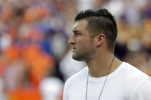 Former Florida quarterback Tim Tebow watches the first half of an NCAA college football game between Florida and LSU, Saturday, Oct. 7, 2017, in Gainesville, Fla. (AP Photo/John Raoux)