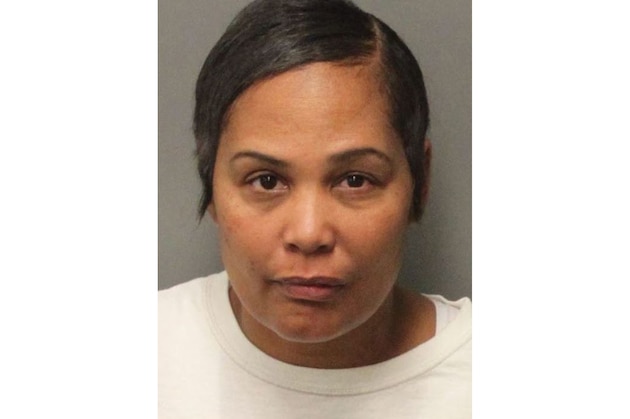 FILE - In this undated photo provided by the Riverside Sheriff's Department shows Sherra Wright, who is fighting an attempt by authorities to extradite her from California to Memphis, Tenn., to face conspiracy and first-degree murder charges in the 2010 death of her ex-husband, former NBA player Lorenzen Wright. Wright is scheduled to make her first court appearance since she was extradited from California on a first-degree murder charge in connection with his death. (Riverside Sheriff's Department via AP, File)