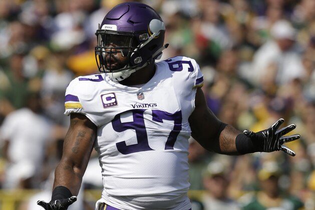 FILE - In this Sunday, Sept. 16, 2018, file photo, Minnesota Vikings defensive end Everson Griffen reacts during the first half of an NFL football game against the Green Bay Packers, in Green Bay, Wis. The Vikings are allowing the sixth-highest passer rating in the NFL one-quarter of the way through this season. One problem has been a pass rush negated by rollouts and misdirections cleverly used by opponents. (AP Photo/Jeffrey Phelps, File)
