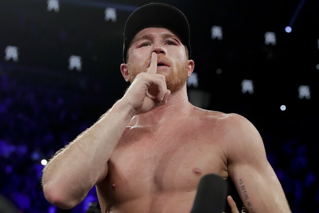 Canelo Alvarez reacts after defeating Gennady Golovkin by majority decision in a middleweight title boxing match, Saturday, Sept. 15, 2018, in Las Vegas. (AP Photo/Isaac Brekken)