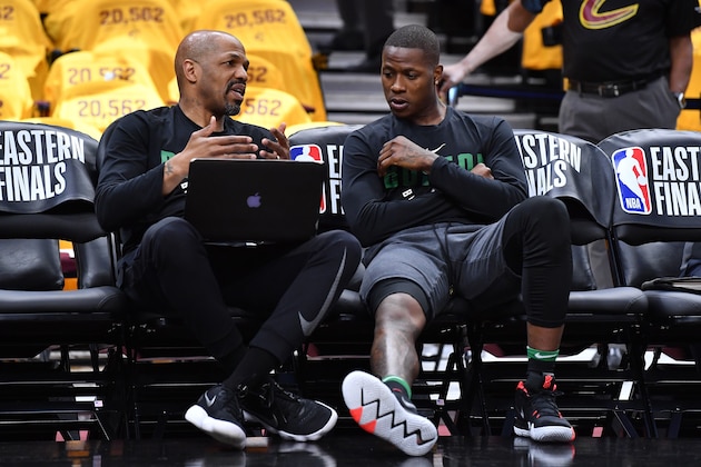 CLEVELAND, OH - MAY 21: Boston Celtics assistant coach Jerome Allen speaks to Terry Rozier #12 before Game Four of the 2018 NBA Eastern Conference Finals against the Cleveland Cavaliers at Quicken Loans Arena on May 21, 2018 in Cleveland, Ohio. NOTE TO USER: User expressly acknowledges and agrees that, by downloading and or using this photograph, User is consenting to the terms and conditions of the Getty Images License Agreement.  (Photo by Jamie Sabau/Getty Images)