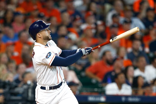 HOUSTON, TX - OCTOBER 05:  George Springer #4 of the Houston Astros watches his solo home run off Corey Kluber #28 of the Cleveland Indians (not pictured) in the fifth inning during Game One of the American League Division Series at Minute Maid Park on October 5, 2018 in Houston, Texas.  (Photo by Bob Levey/Getty Images)