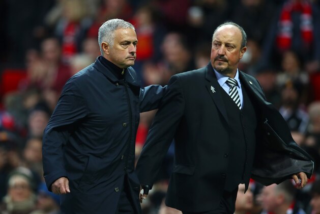 MANCHESTER, ENGLAND - OCTOBER 06:  Jose Mourinho, Manager of Manchester United and Rafael Benitez, Manager of Newcastle United walk off the pitch at half time of the Premier League match between Manchester United and Newcastle United at Old Trafford on October 6, 2018 in Manchester, United Kingdom.  (Photo by Clive Brunskill/Getty Images)