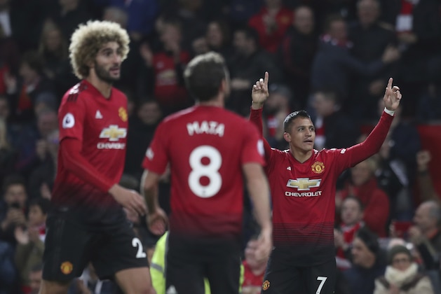 Manchester United's Alexis Sanchez celebrates after scoring his sides 3rd goal during their English Premier League soccer match between Manchester United and Newcastle United at Old Trafford in Manchester, England, Saturday, Oct. 6, 2018. (AP Photo/Jon Super)