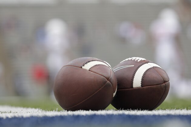 HOUSTON, TX - SEPTEMBER 01: Footballs lie on the turf before the game between the Rice Owls and the Houston Cougars at Rice Stadium on September 1, 2018 in Houston, Texas. (Photo by Tim Warner/Getty Images) HOUSTON, TX - SEPTEMBER 01: Footballs lie on the turf before the game between the Rice Owls and the Houston Cougars at Rice Stadium on September 1, 2018 in Houston, Texas. (Photo by Tim Warner/Getty Images)