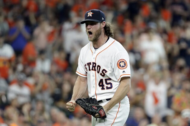 Houston Astros starting pitcher Gerrit Cole (45) reacts after striking out Cleveland Indians' Jose Ramirez to end the sixth inning of Game 2 of a baseball American League Division Series, Saturday, Oct. 6, 2018, in Houston. (AP Photo/David J. Phillip) Houston Astros starting pitcher Gerrit Cole (45) reacts after striking out Cleveland Indians' Jose Ramirez to end the sixth inning of Game 2 of a baseball American League Division Series, Saturday, Oct. 6, 2018, in Houston. (AP Photo/David J. Phillip)