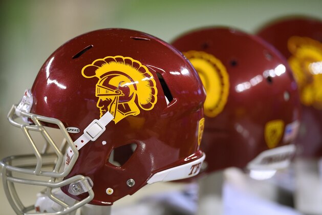 SANTA CLARA, CA - DECEMBER 05:  A detailed view of USC Trojans football helmets sitting on the bench against the Stanford Cardinal during the third quarter of the NCAA Pac-12 Championship game at Levi's Stadium on December 5, 2015 in Santa Clara, California.  (Photo by Thearon W. Henderson/Getty Images)