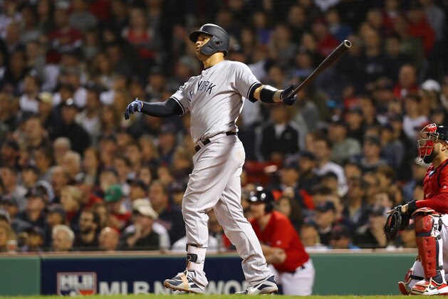 BOSTON, MA - OCTOBER 06:  Gary Sanchez #24 of the New York Yankees watches the ball leave the ball park over center field for a three-run home run against pitcher Eduardo Rodriguez #57 of the Boston Red Sox (not in photo) during the seventh inning Game Two of the American League Division Series at Fenway Park on October 6, 2018 in Boston, Massachusetts.s.  (Photo by Tim Bradbury/Getty Images)