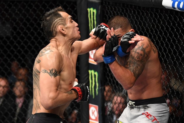 LAS VEGAS, NV - OCTOBER 06:  Tony Ferguson punches Anthony Pettis in their lightweight bout during the UFC 229 event inside T-Mobile Arena on October 6, 2018 in Las Vegas, Nevada.  (Photo by Josh Hedges/Zuffa LLC/Zuffa LLC)