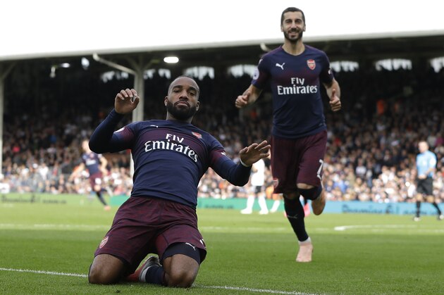 Arsenal's Alexandre Lacazette celebrates scoring his side's second goal during the English Premier League soccer match between Fulham and Arsenal at Craven Cottage stadium in London, Sunday, Oct. 7, 2018. (AP Photo/Kirsty Wigglesworth)