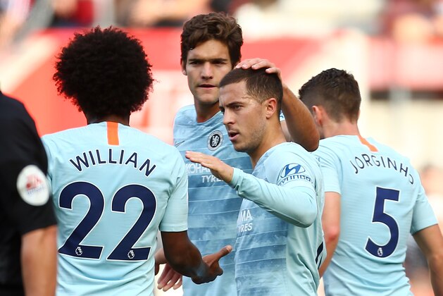 SOUTHAMPTON, ENGLAND - OCTOBER 07:  Eden Hazard of Chelsea celebrates with teammates Marcos Alonso, and Willian after scoring his team's first goal during the Premier League match between Southampton FC and Chelsea FC at St Mary's Stadium on October 7, 2018 in Southampton, United Kingdom.  (Photo by Jordan Mansfield/Getty Images)