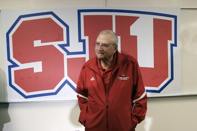 St. John's University head football coach John Gagliardi ends his news conference after announcing his retirement in his 60th season as coach Monday, Nov. 19, 2012 in Collegeville, Minn. Gagliardi, 86, is the winningest coach in college football. (AP Photo/Jim Mone)