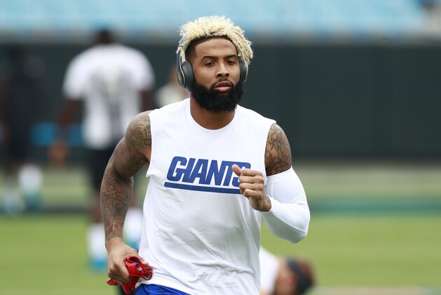 New York Giants' Odell Beckham warms up before an NFL football game against the Carolina Panthers in Charlotte, N.C., Sunday, Oct. 7, 2018. (AP Photo/Jason E. Miczek)